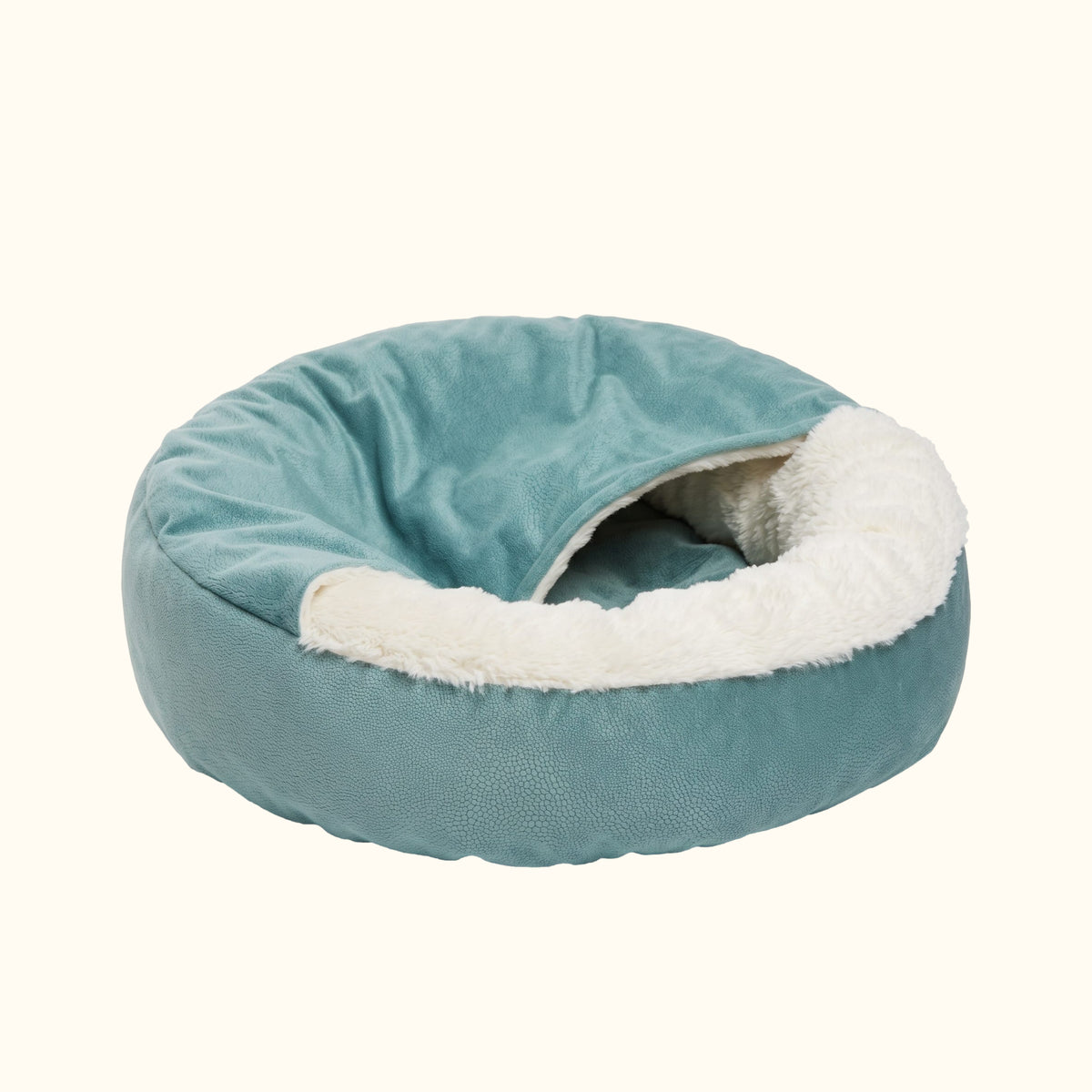 Panier apaisant rond pour chien et chat bleu émeraude, intérieur en fausse fourrure et couverture intégrée